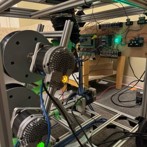 The mechanisms and electronics inside the tennis ball machine